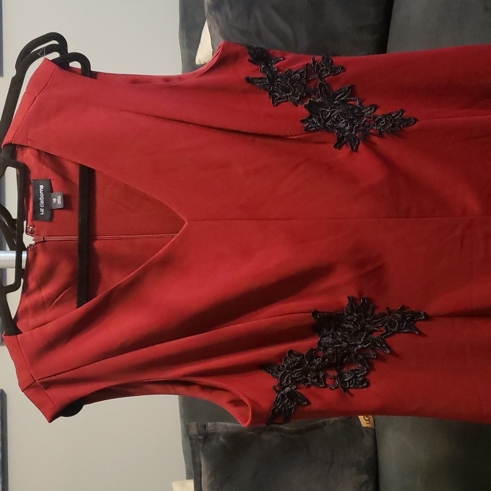 Beautiful red A line dress with black embroidery at the waist on front and back